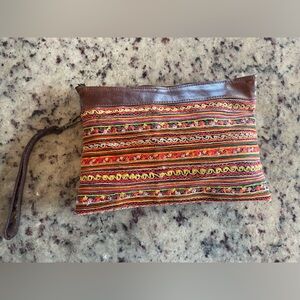 Anthropologie Leather embroidered wristlet